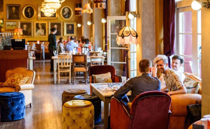 People sititng in Cosy Club Bath